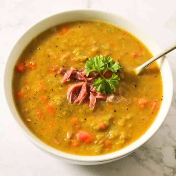 A bowl of Split pea soup with ham bone made after reading these Leftover ham recipes