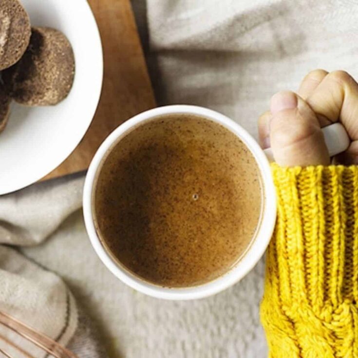A person holding Filipino Tsokolate hot chocolate