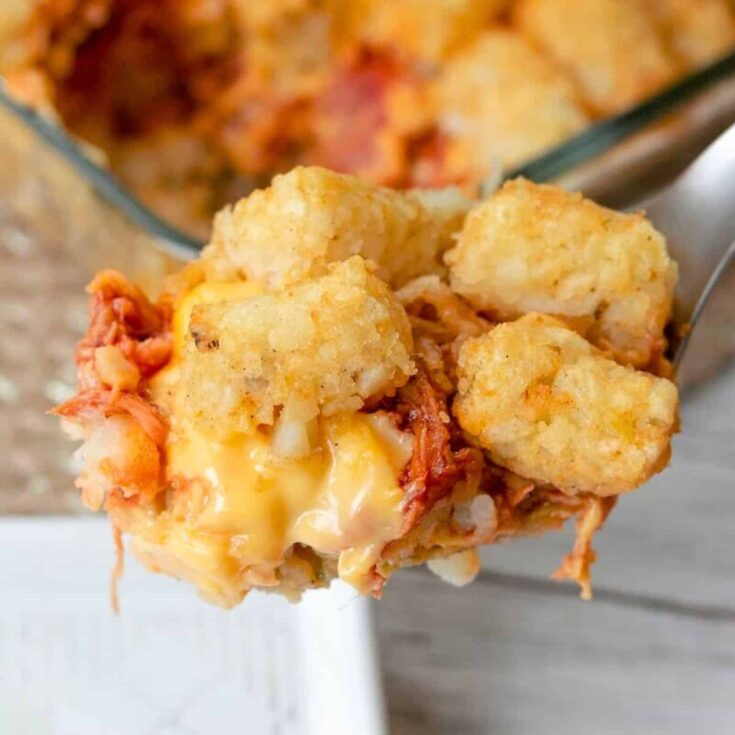 A spoonful of tater tot casserole made after reading these leftover pulled pork recipes