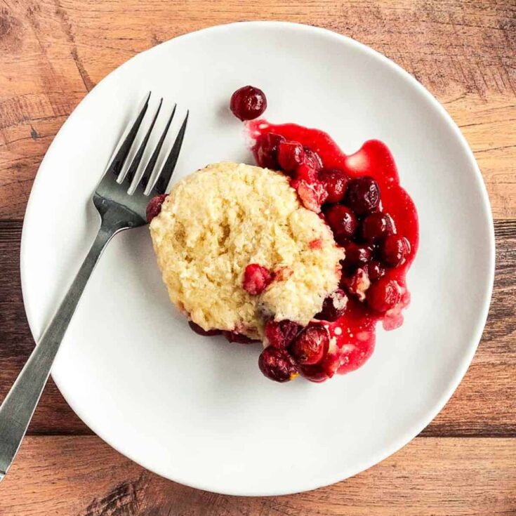 A plate of Dutch oven cranberry cobbler