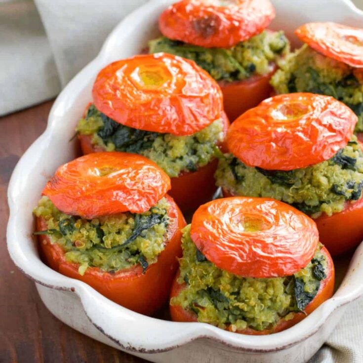 Pesto spinach quinoa stuffed tomatoes