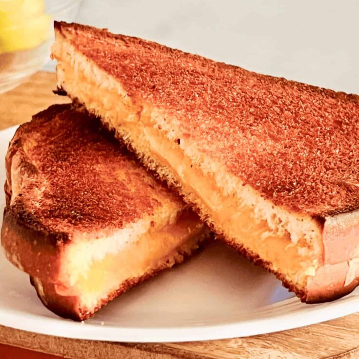A plate of toaster oven grilled cheese sandwich