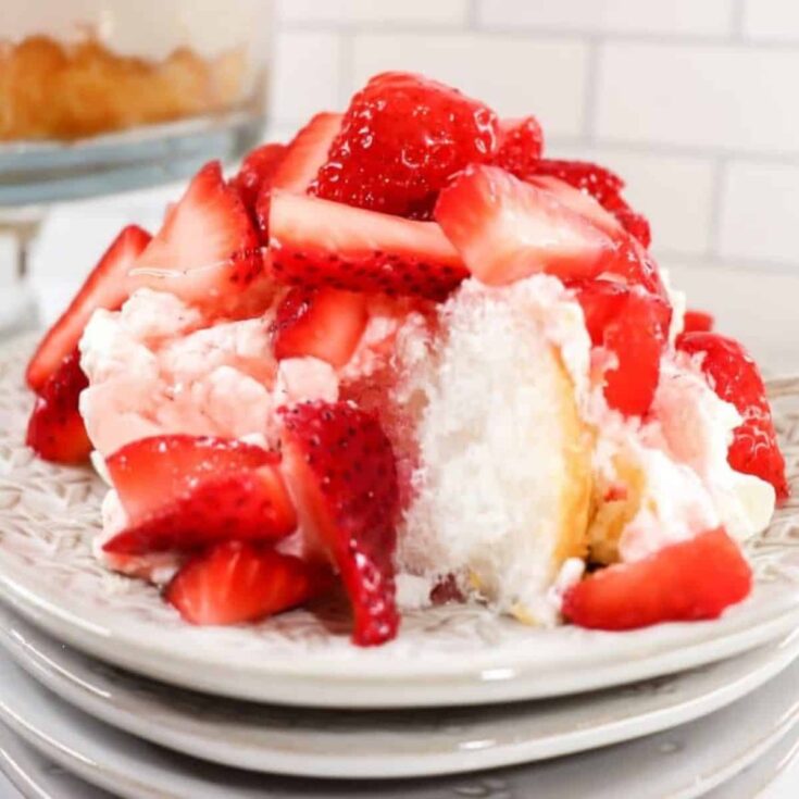 A plate of Angel food cake with strawberries