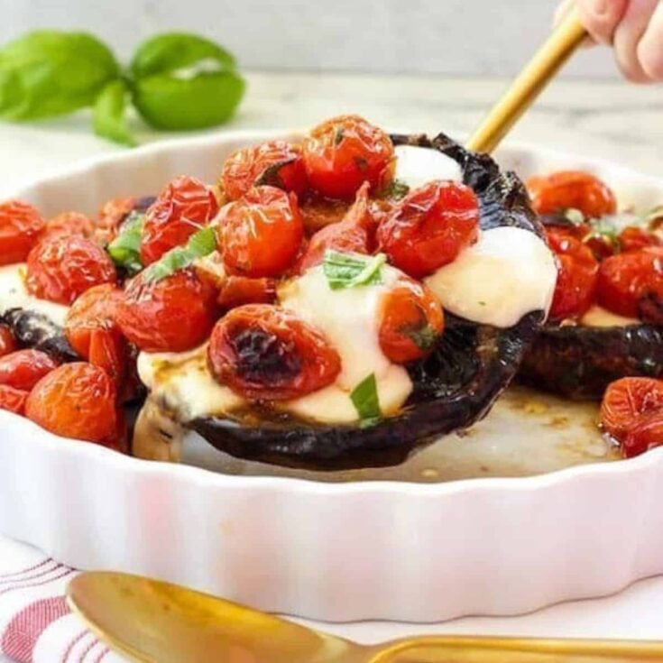 A bowl of Caprese stuffed portobello mushrooms