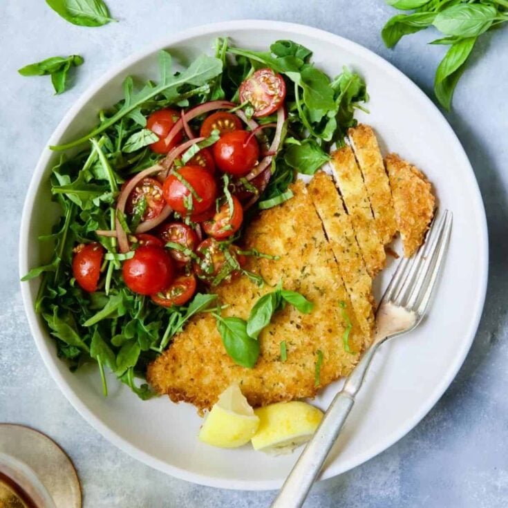 A plate of chicken Milanese summer dinner ideas