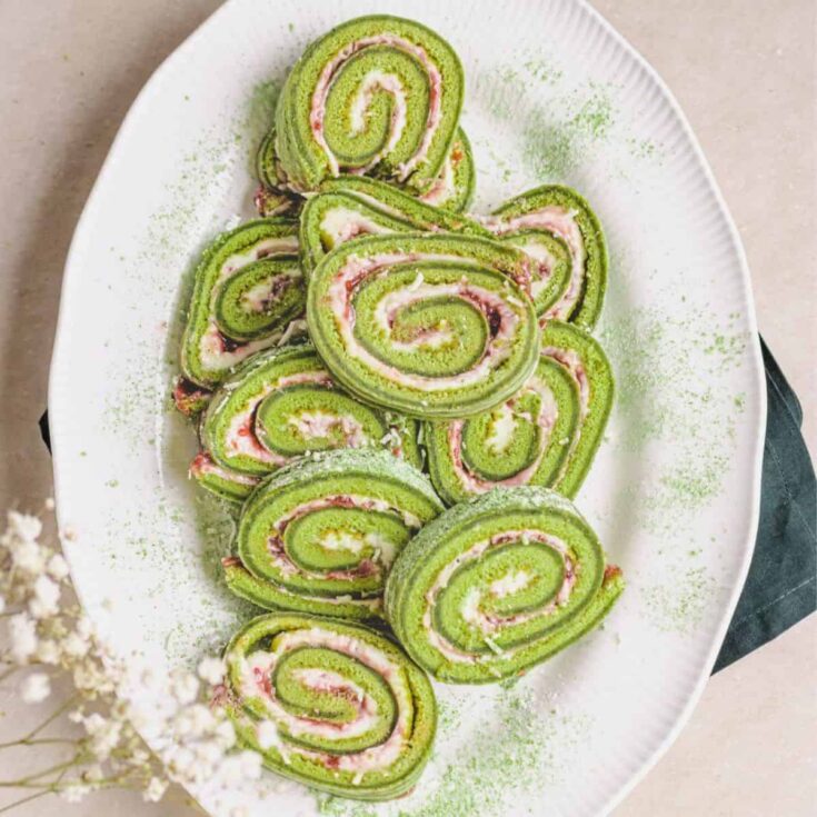 Slice of Matcha roll cake on a plate