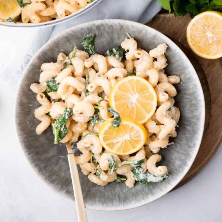 One pot ricotta cheese pasta topped with sliced lemons