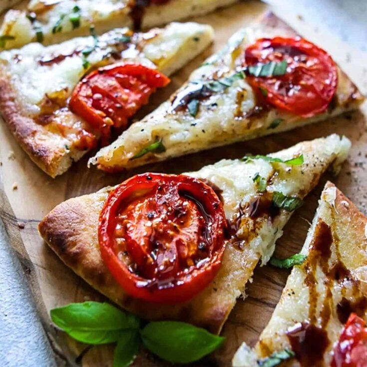 Slices of quick flatbread pizza Margherita