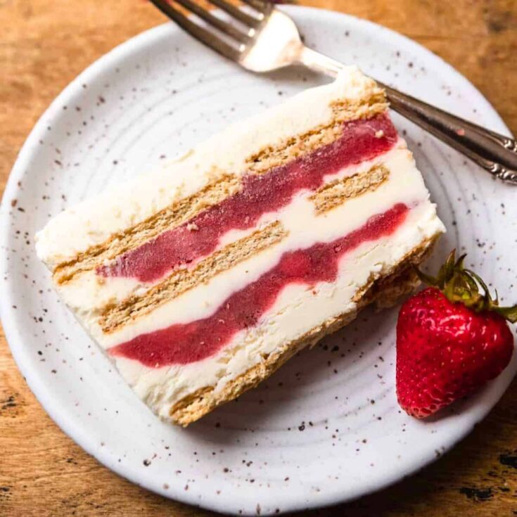 A slice of strawberry cream cheese icebox cake