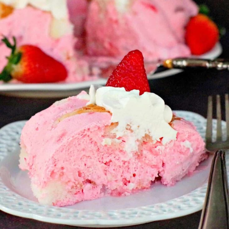 A plate of strawberry jello angel food cake