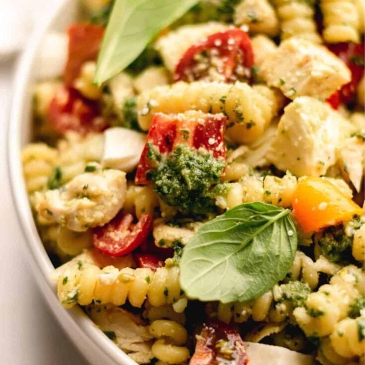Summer pesto chicken pasta salad in a bowl