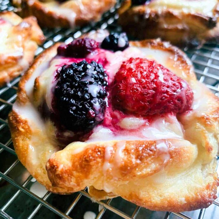 Cream cheese Danish topped with blackberry and strawberry