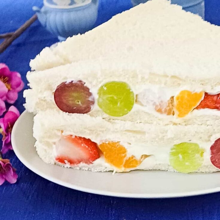 Fresh fruit cream cheese picnic sandwich on a plate