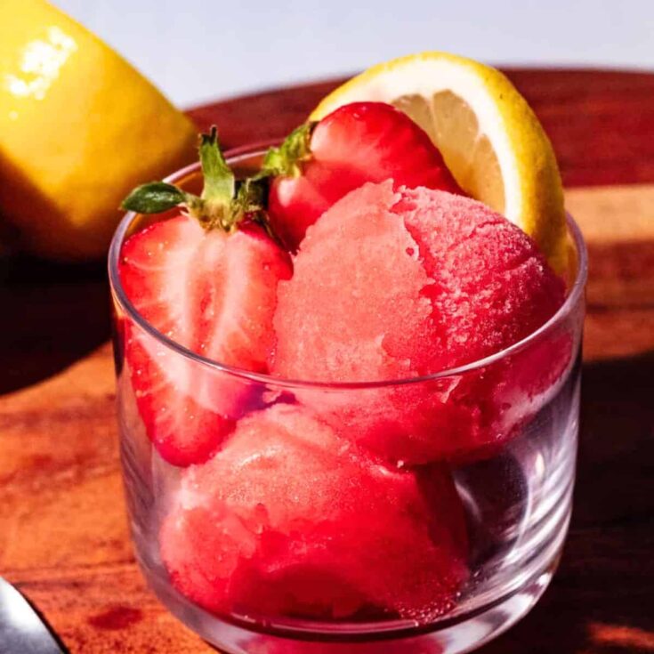 A glass of homemade strawberry lemonade sorbet