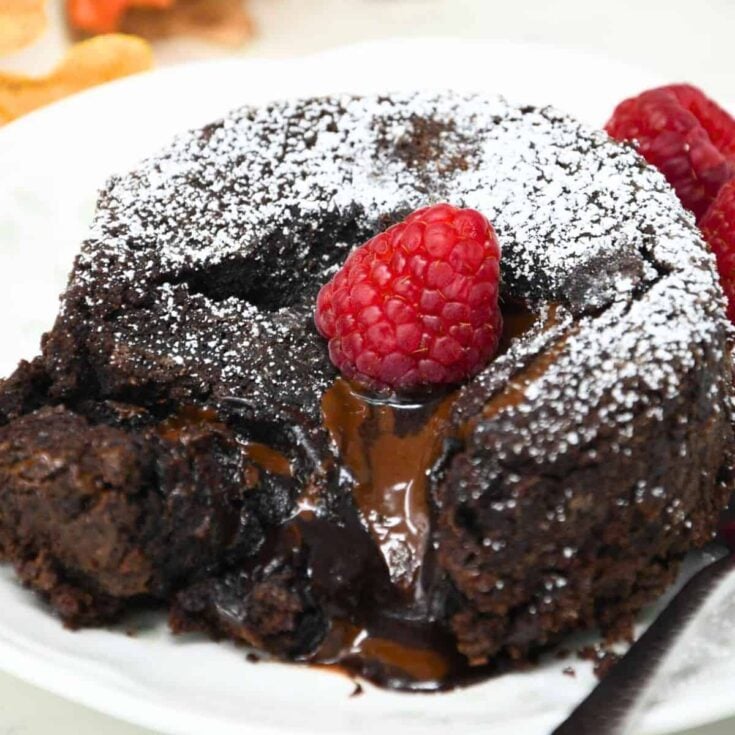 Lava cake topped with fresh raspberries