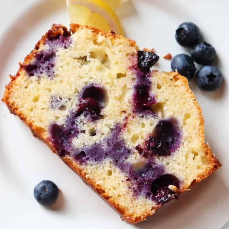 A slice of lemon blueberry ricotta pound cake