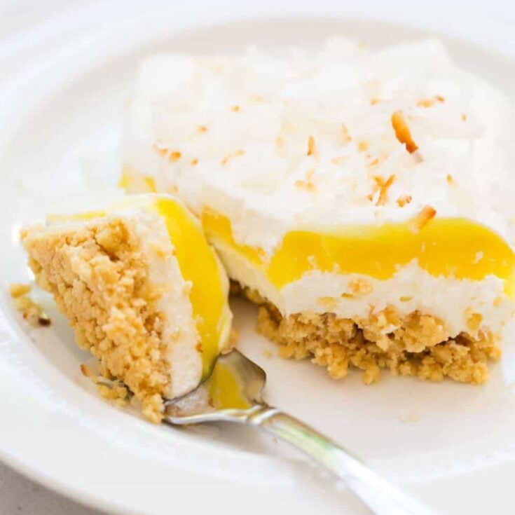 A slice of lemon coconut dessert lasagna