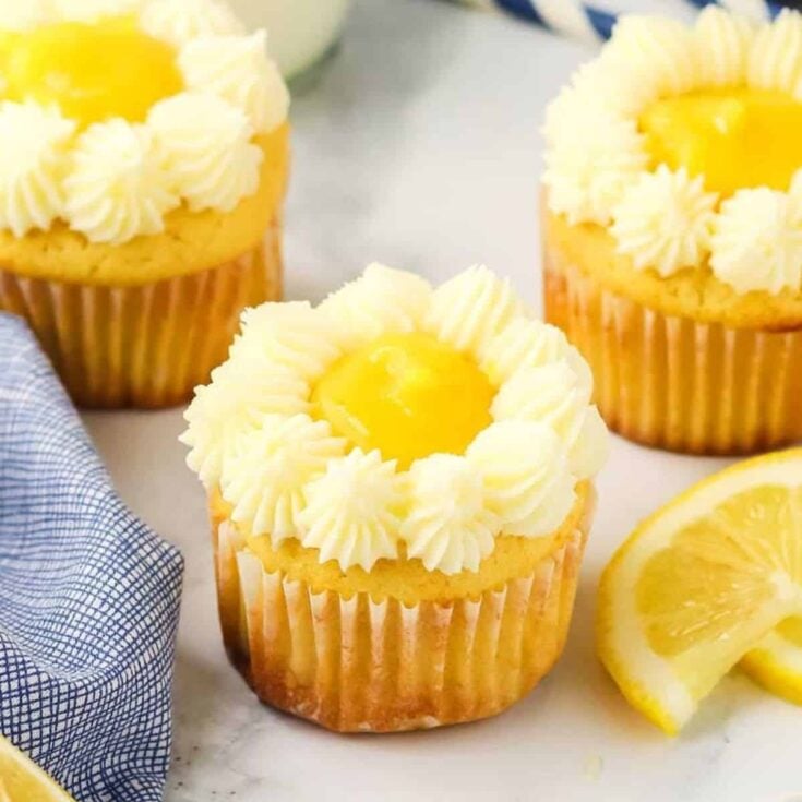 Lemon curd filled cupcakes with buttercream frosting dessert