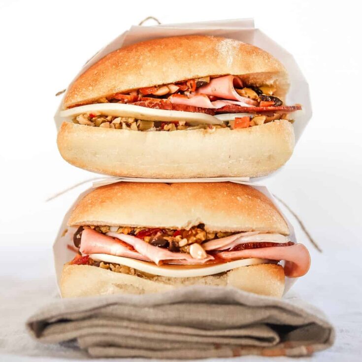 Two Muffuletta picnic sandwiches