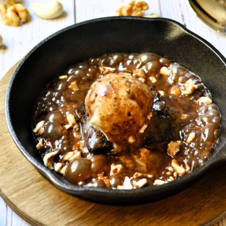 Sizzling brownie with ice cream on a pan