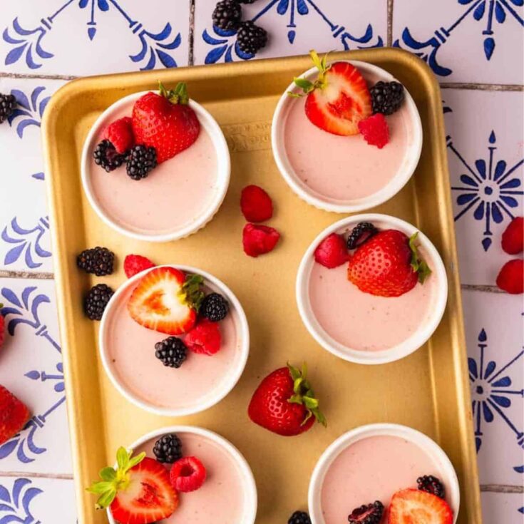 Small bowls of strawberry panna cotta
