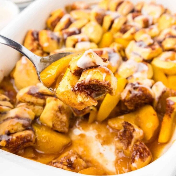 Cinnamon roll peach cobbler dessert