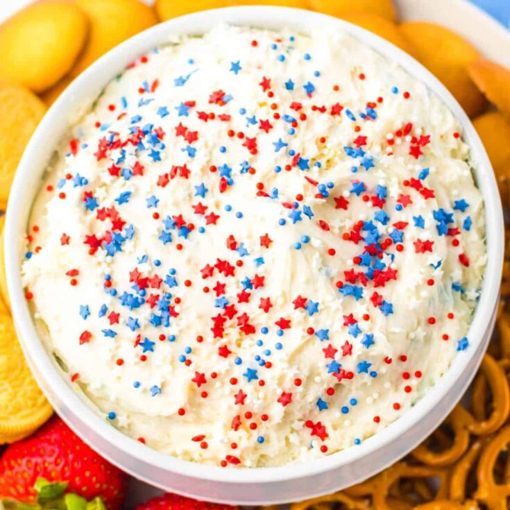 Funfetti dip with pretzel, strawberry, and biscuits on the side