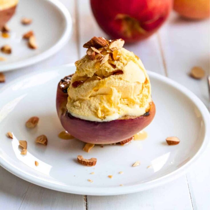 Grilled peaches with vegan peach ice cream