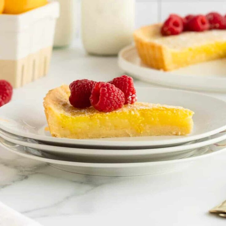 A slice of lemon tart fancy dessert