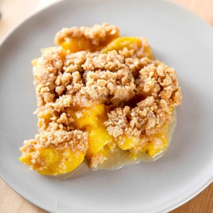 Peach crumble on a plate