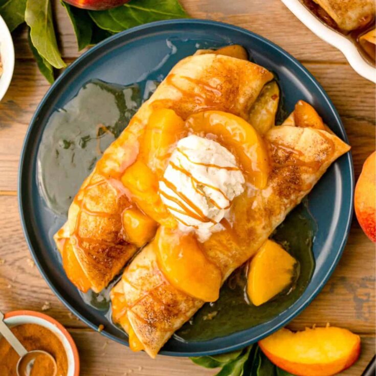 Peach pie enchiladas on a plate