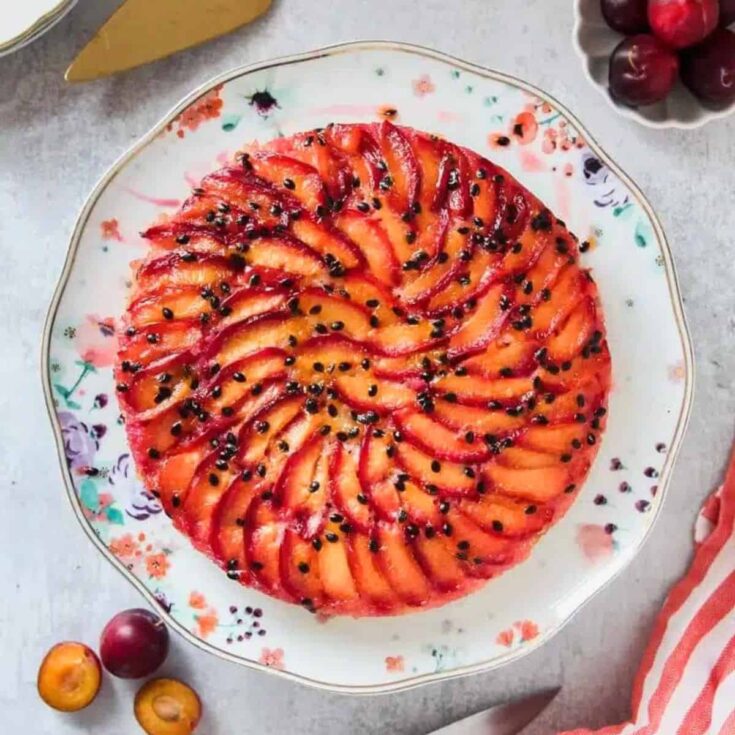 Upside down plum and passionfruit cake