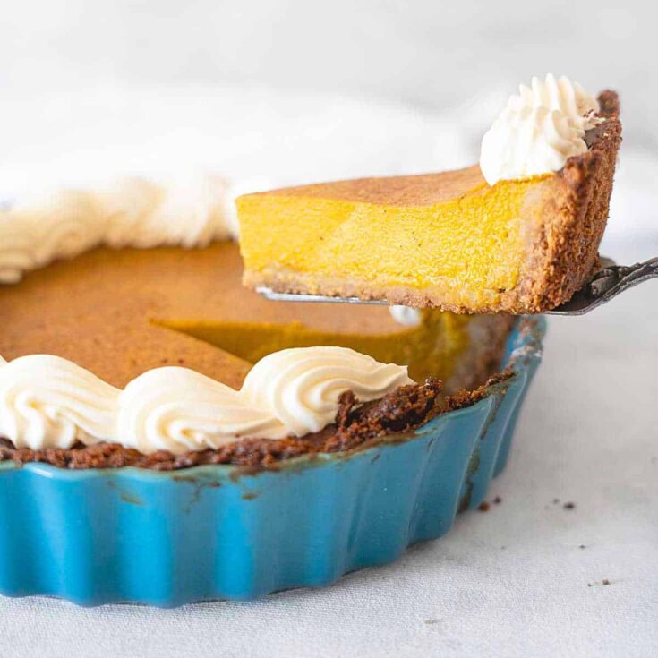 A slice of creamy pumpkin custard pie