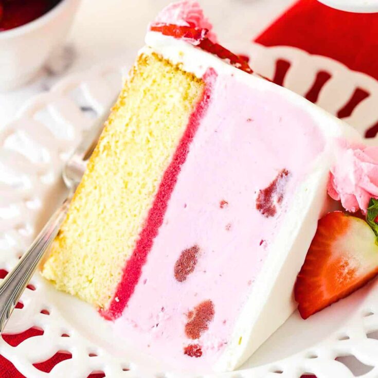 A slice of strawberry ice cream cake