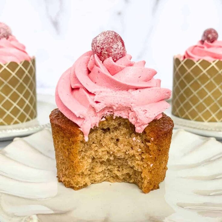 Apple cider cupcakes with cranberry buttercream
