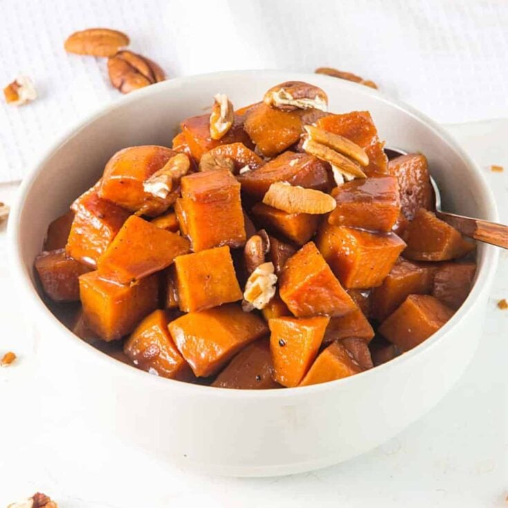 A bowl of candied sweet potatoes
