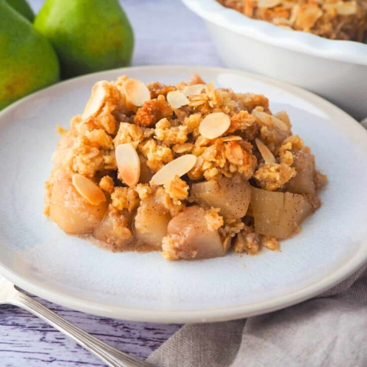 Pear crumble served on a plate