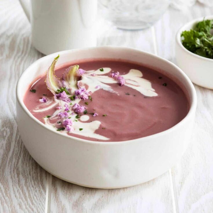 A bowl of purple cauliflower fall soup