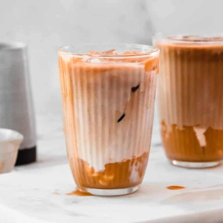 Caramel mocha iced latte coffee drink with oat milk