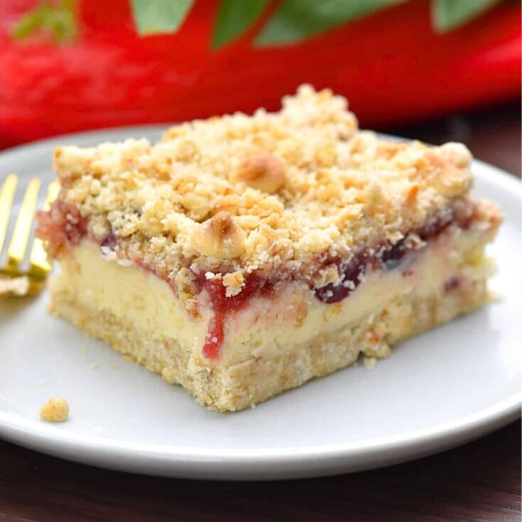Cranberry cheesecake bar on a plate