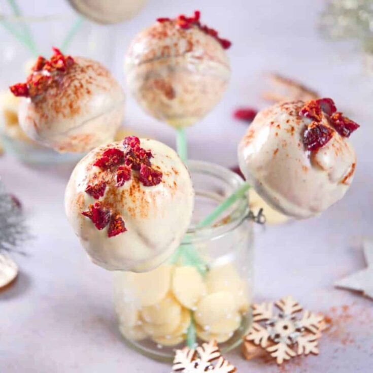 Cranberry white chocolate cake pops placed in a mason jar