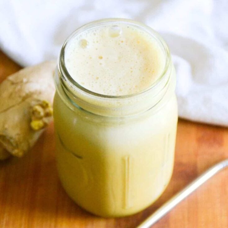 One mug of golden milk iced coffee drink