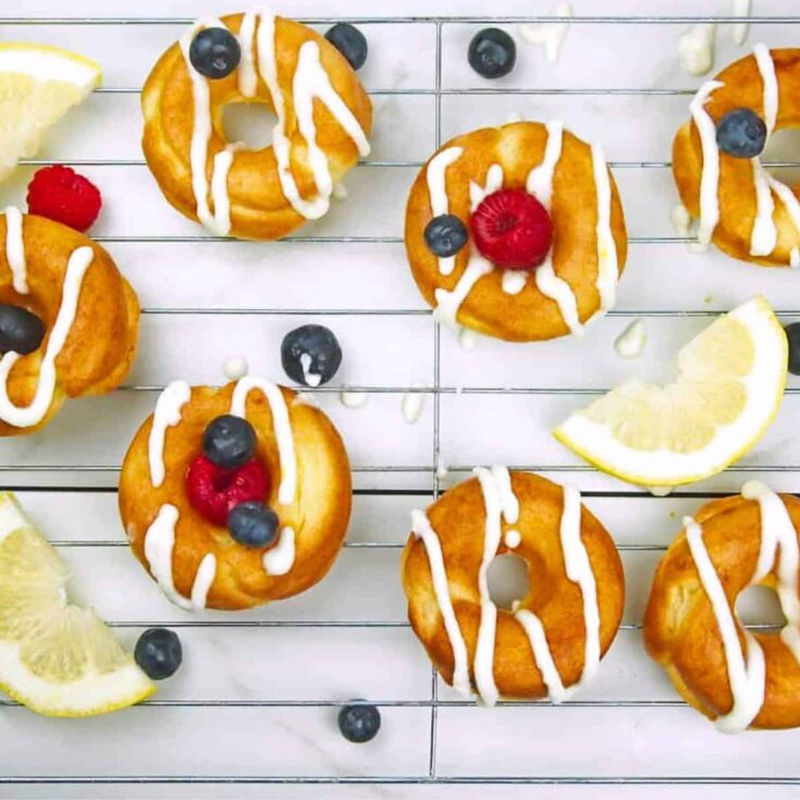 Lemon mascarpone donuts topped with blueberries and raspberries