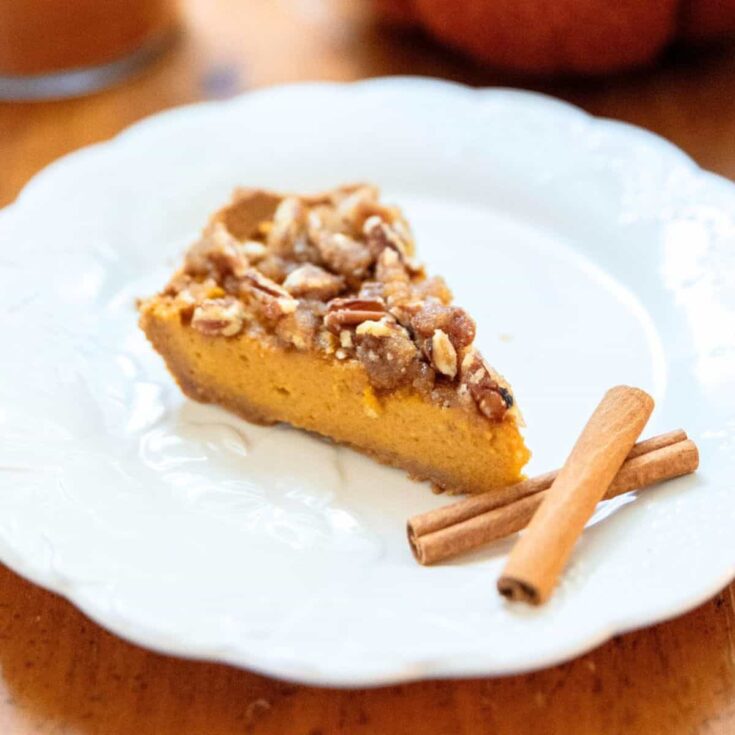 A slice of pecan pie pumpkin cheesecake
