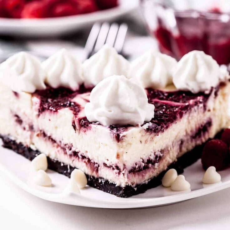 A slice of raspberry cheesecake