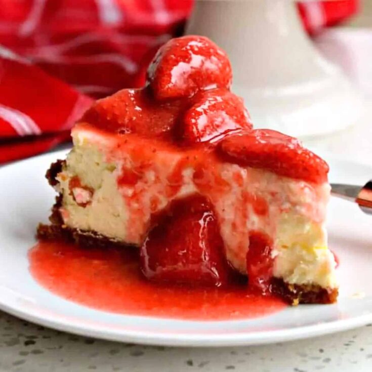 A slice of strawberry cheesecake