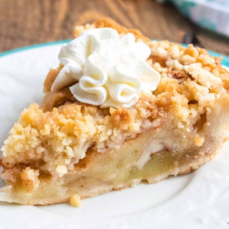 A slice of apple crumble pie dessert