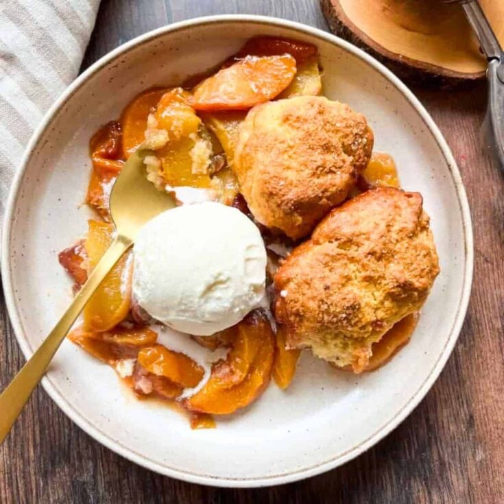 Brown sugar peach cobbler on a plate