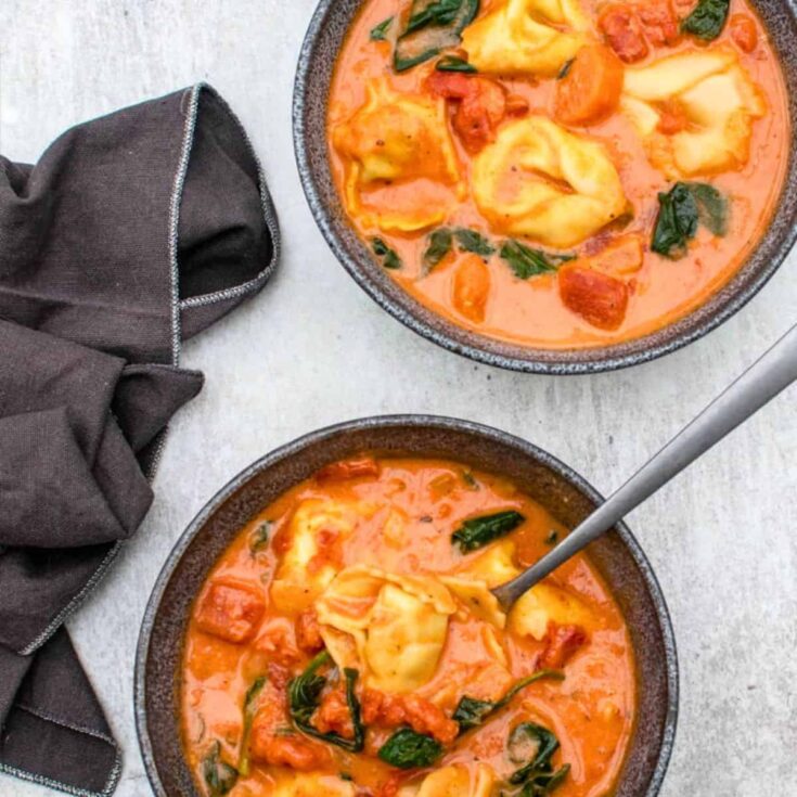 Two bowls of creamy tortellini winter soup