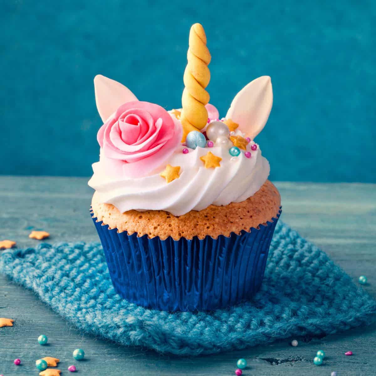 A unicorn themed cupcake, made after reading these unicorn party food ideas